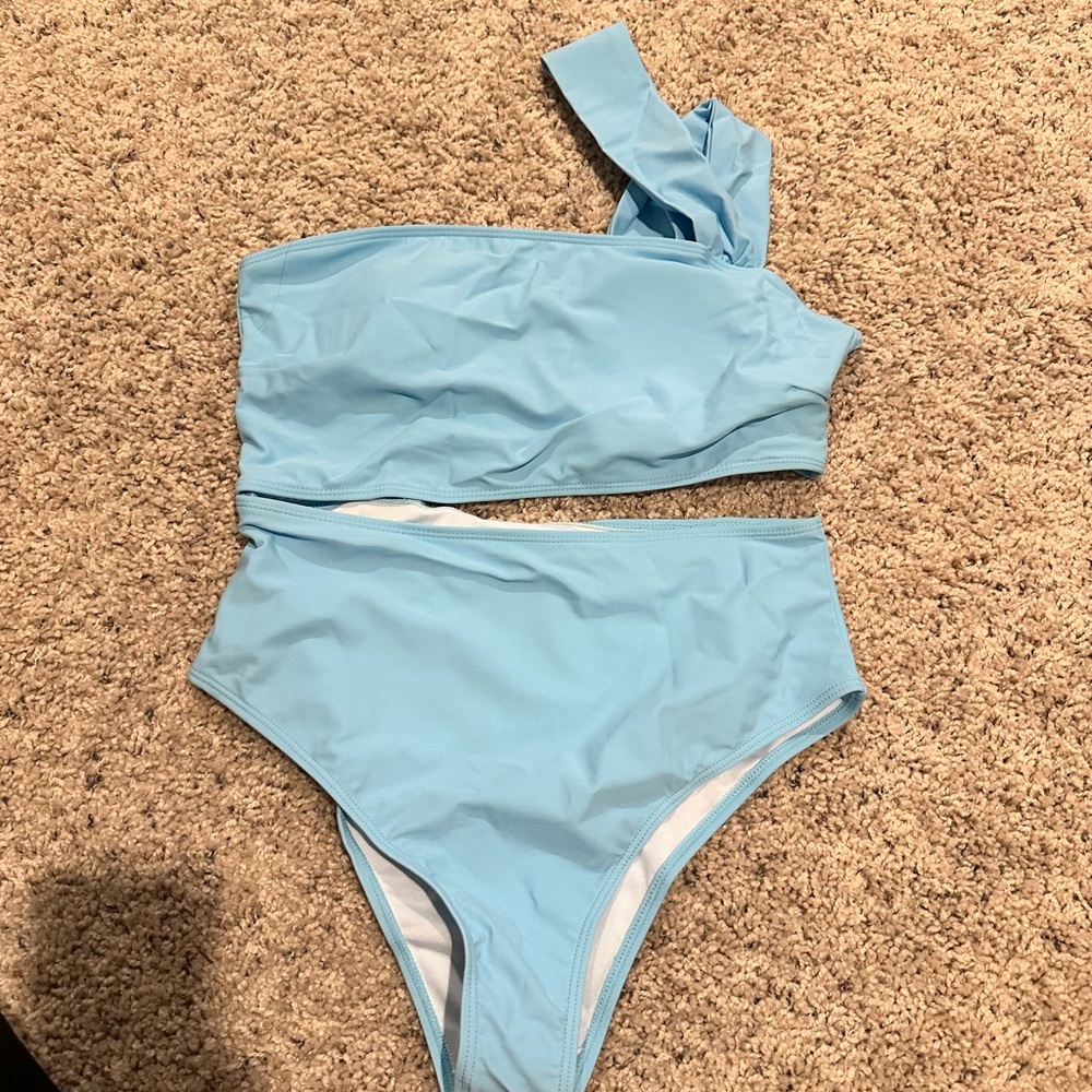 NWOT light blue one piece cut out bathing suit